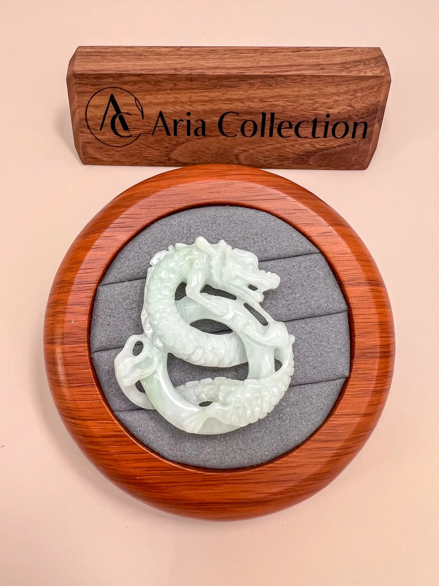Aria Design Collection large hand-carved jadeite jade spiral dragon pendant, pale green translucent style