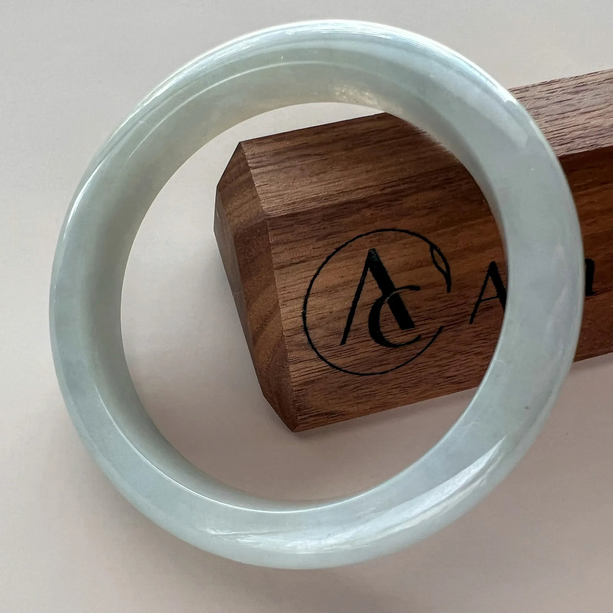 Aria Design Collection icy light gray Burmese Type A jadeite jade bangle, classic polished style