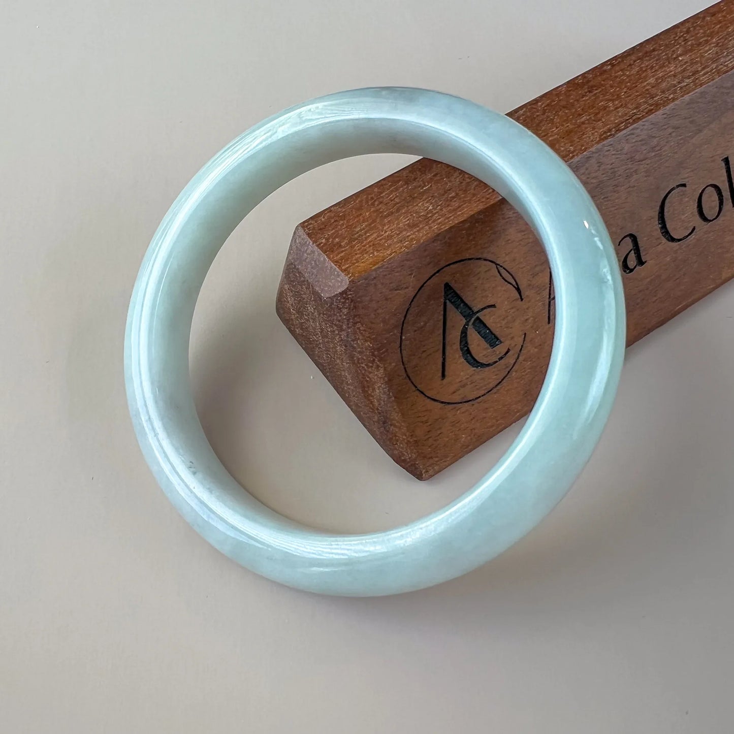 Aria Collection smooth light blue Natural Jade bangle with glossy polished rounded finish