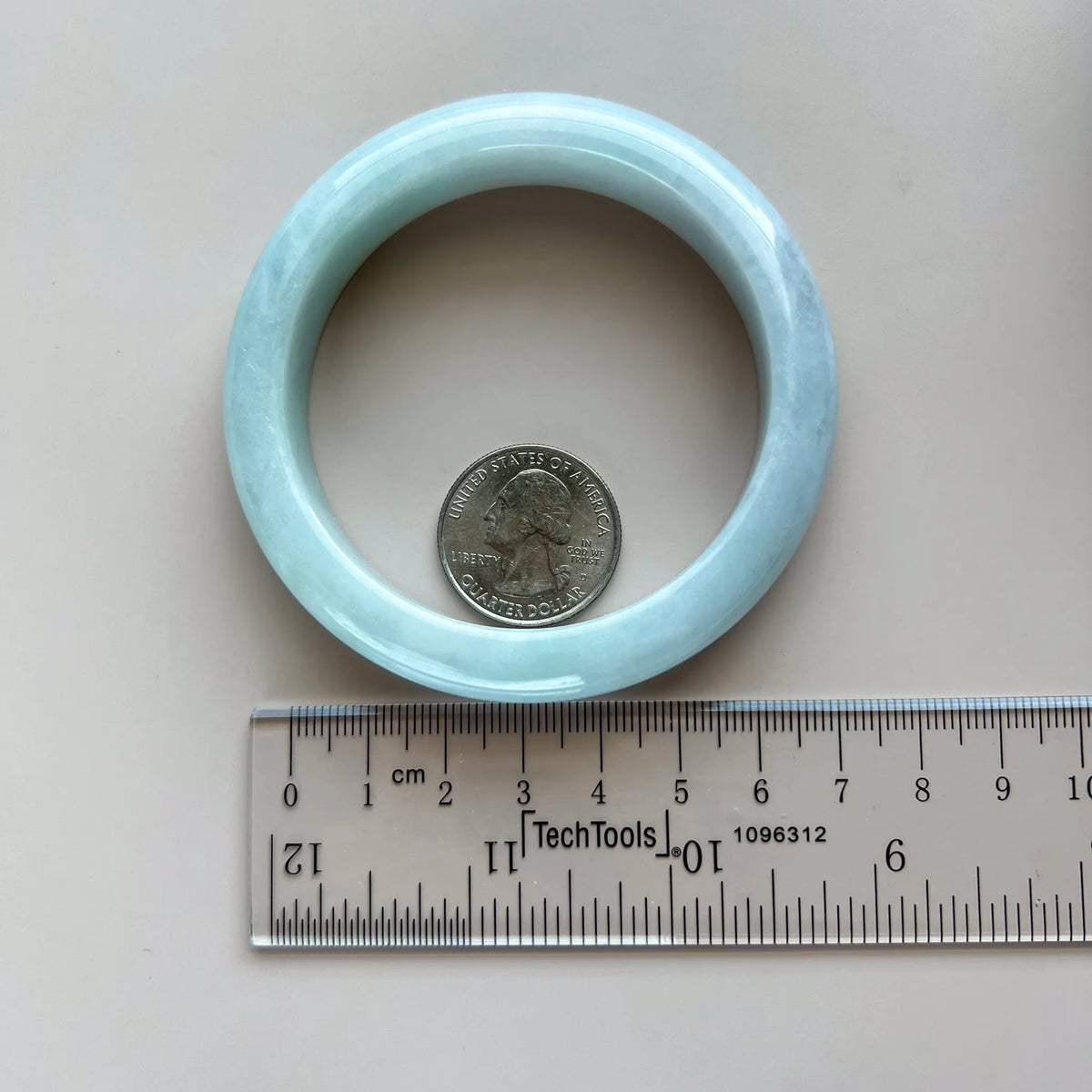 Aria Design Collection classic light blue jadeite bangle with a smooth rounded profile and polished finish