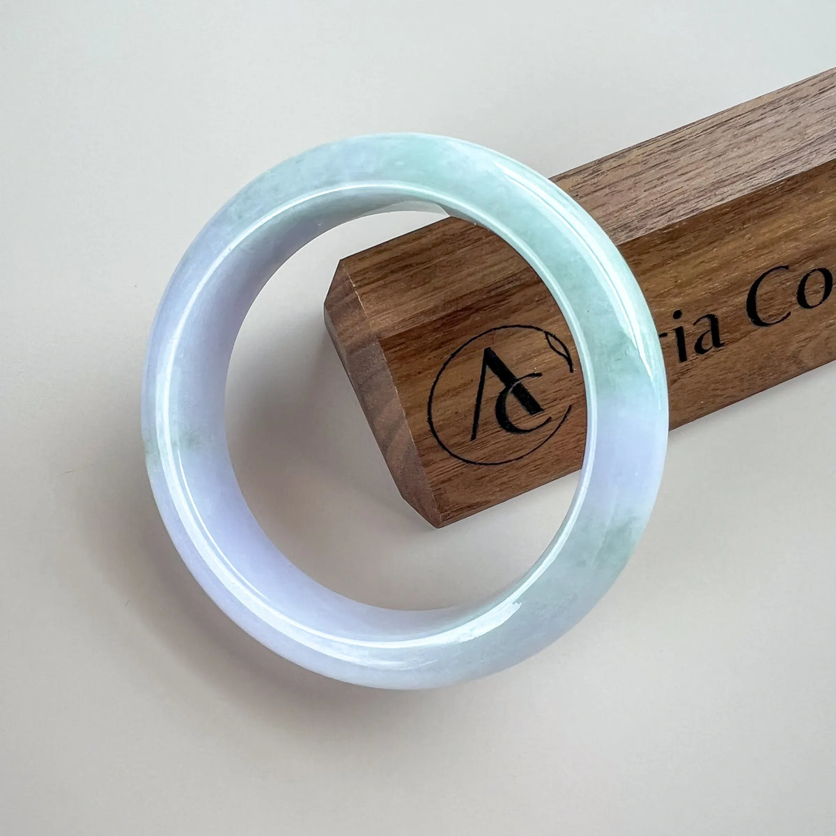 Aria Design Collection uncarved light green and lavender jadeite bangle with polished finish