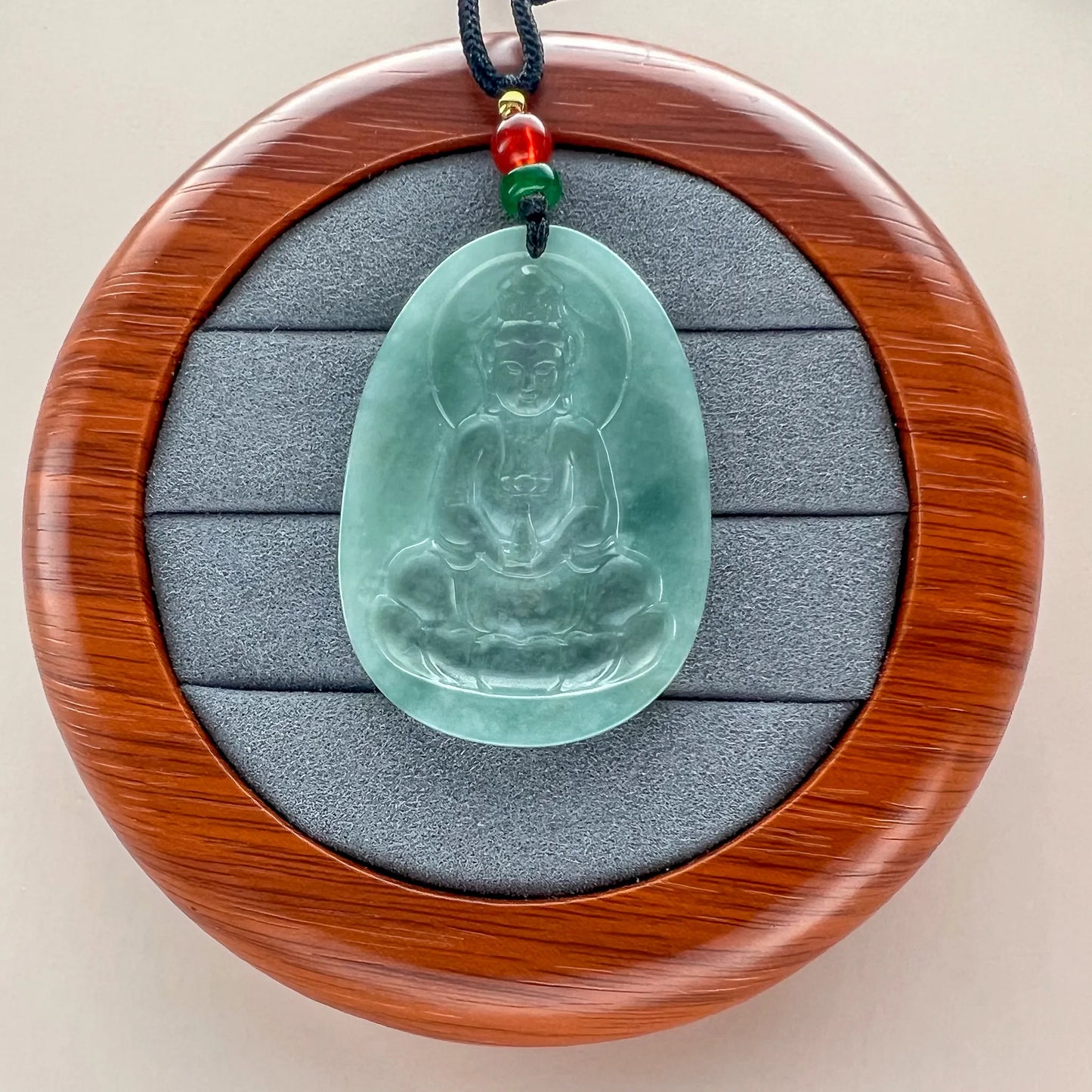 Aria Design Collection light green Natural Jade Guan Yin pendant with translucent polished relief carving