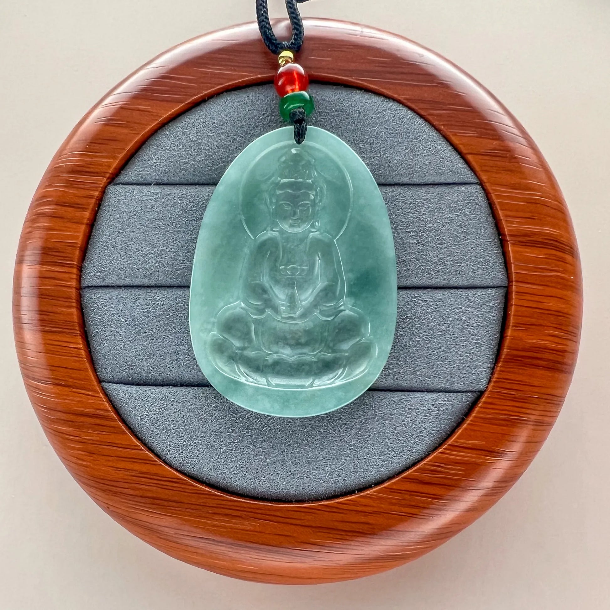 Aria Design Collection light green Natural Jade Guan Yin pendant with translucent polished relief carving