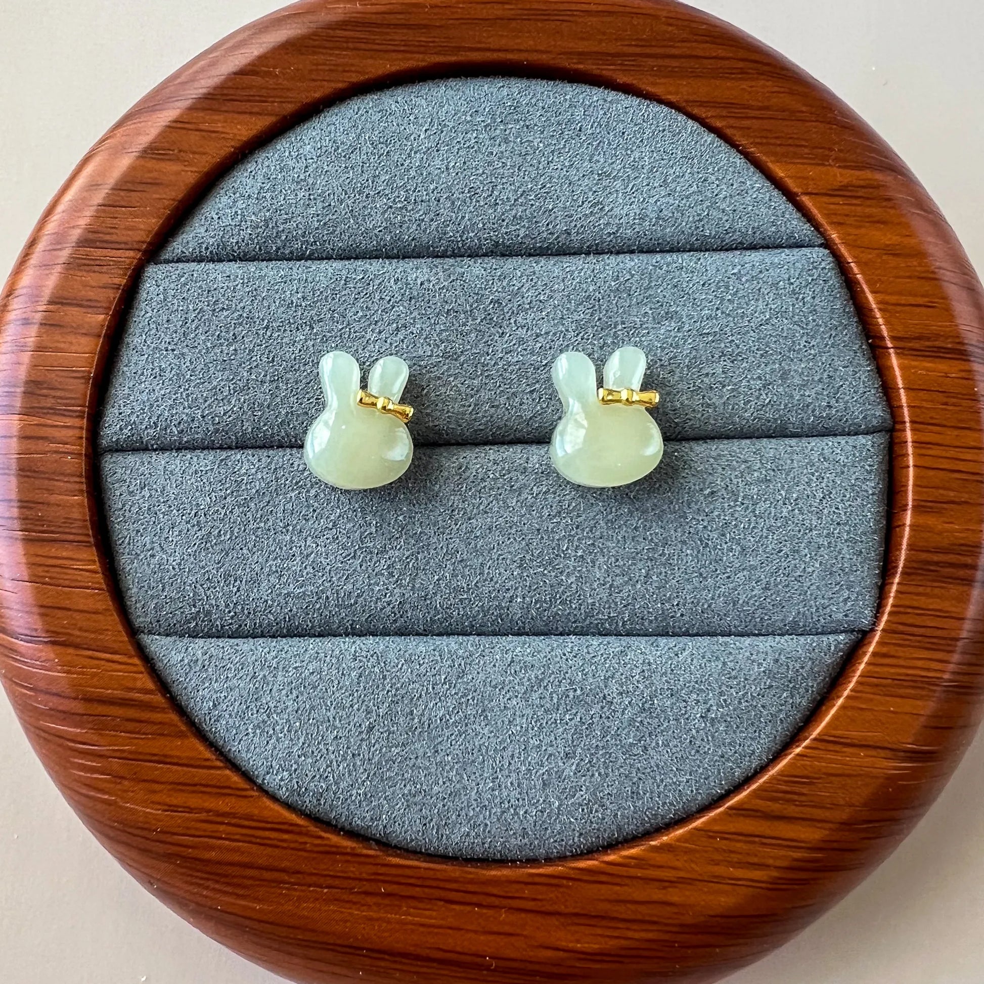 Aria Collection light green Natural Jade bunny stud earrings with polished finish and gold-tone bows