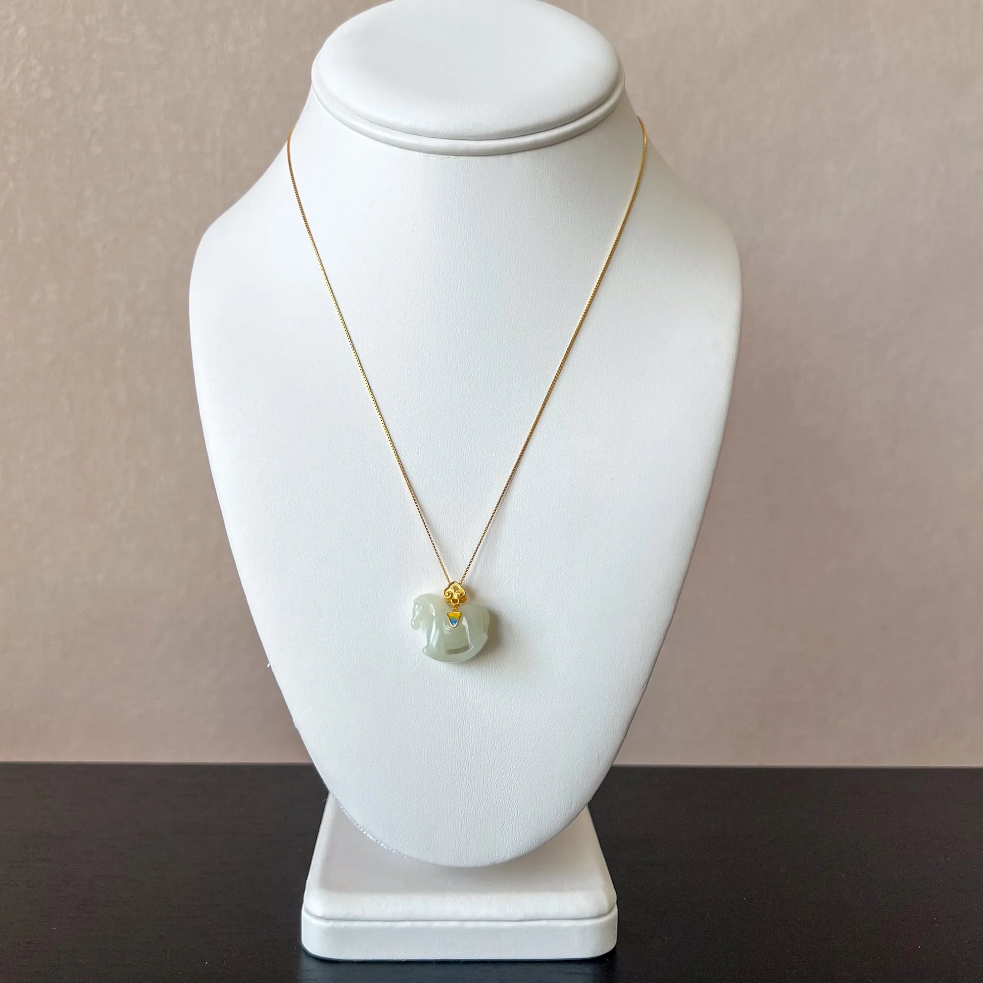 Aria Collection light green Natural Jade rocking horse pendant with polished finish