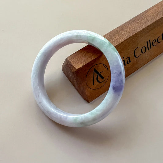 Aria Design Collection uncarved lavender-green jadeite bangle with a polished rounded finish