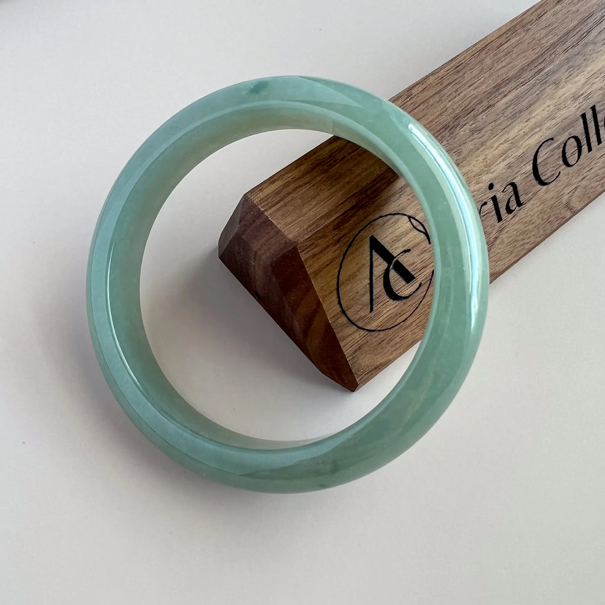 Aria Design Collection light green-blue jadeite bangle with a classic uncarved form and polished finish