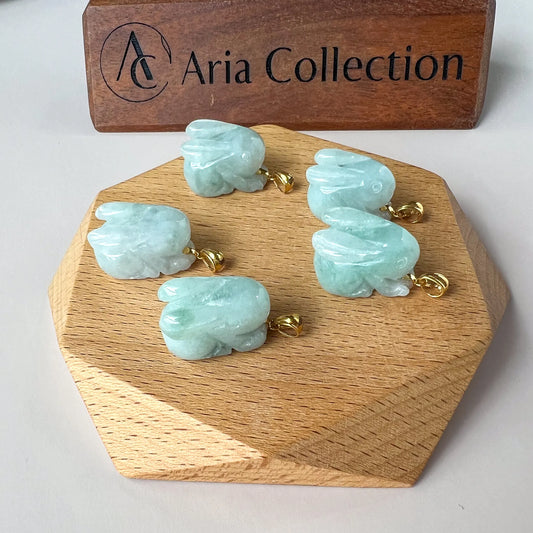 Aria Collection carved rabbit Natural Jade pendant in pale aqua green with glossy polished finish