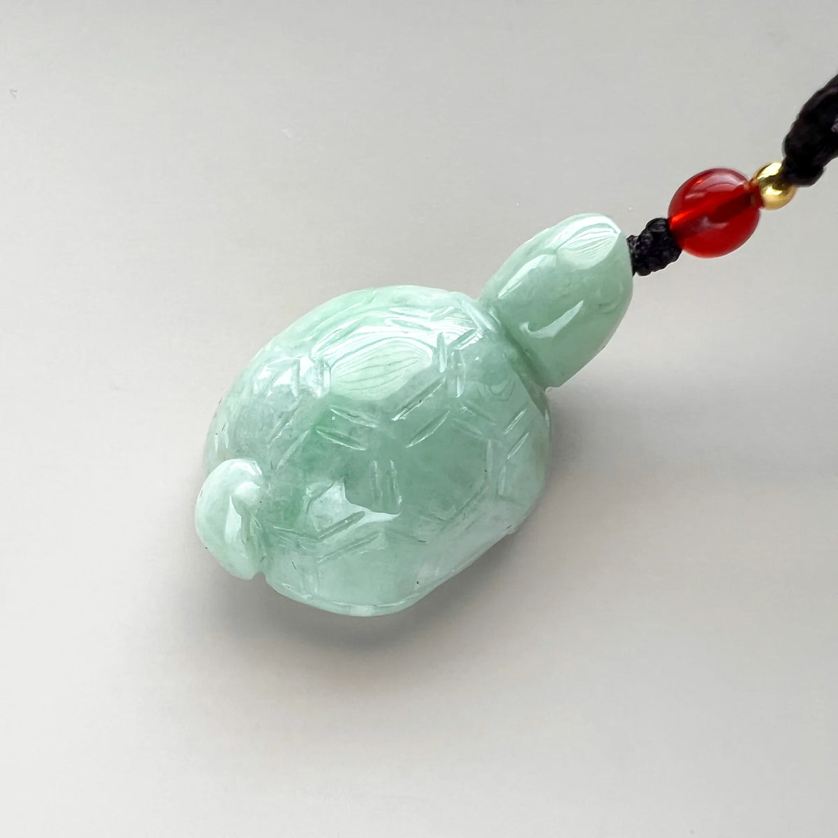 Aria Design Collection light green natural jade dragon turtle carving with a polished finish