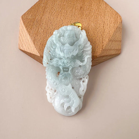 Aria Collection carved Natural Jade dragon pendant in icy blue with polished finish and gold-tone bail