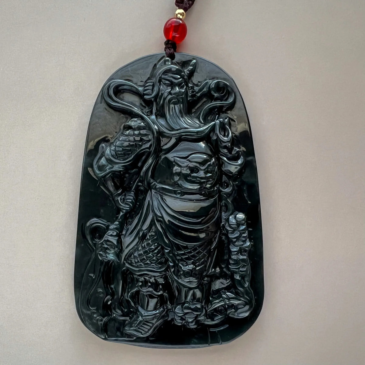 Aria Design Collection dark green natural jade Guan Gong relief pendant with glossy finish