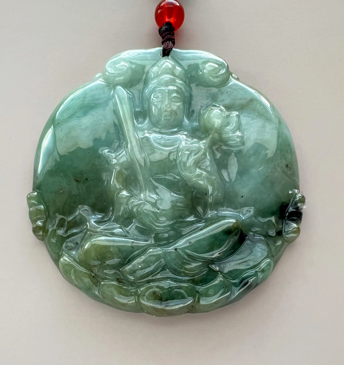Aria Design Collection green natural jade pendant with polished Manjushri Buddha sword carving