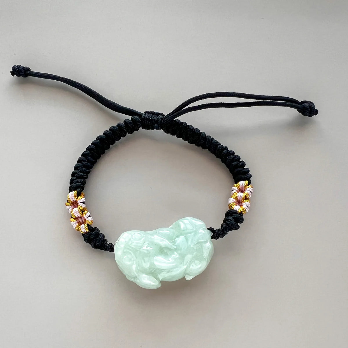 Aria Design Collection light green Natural Jade Pixiu carving with polished finish on black cord