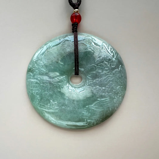 Aria Design Collection pale green natural jade pendant with landscape relief carving and polished finish