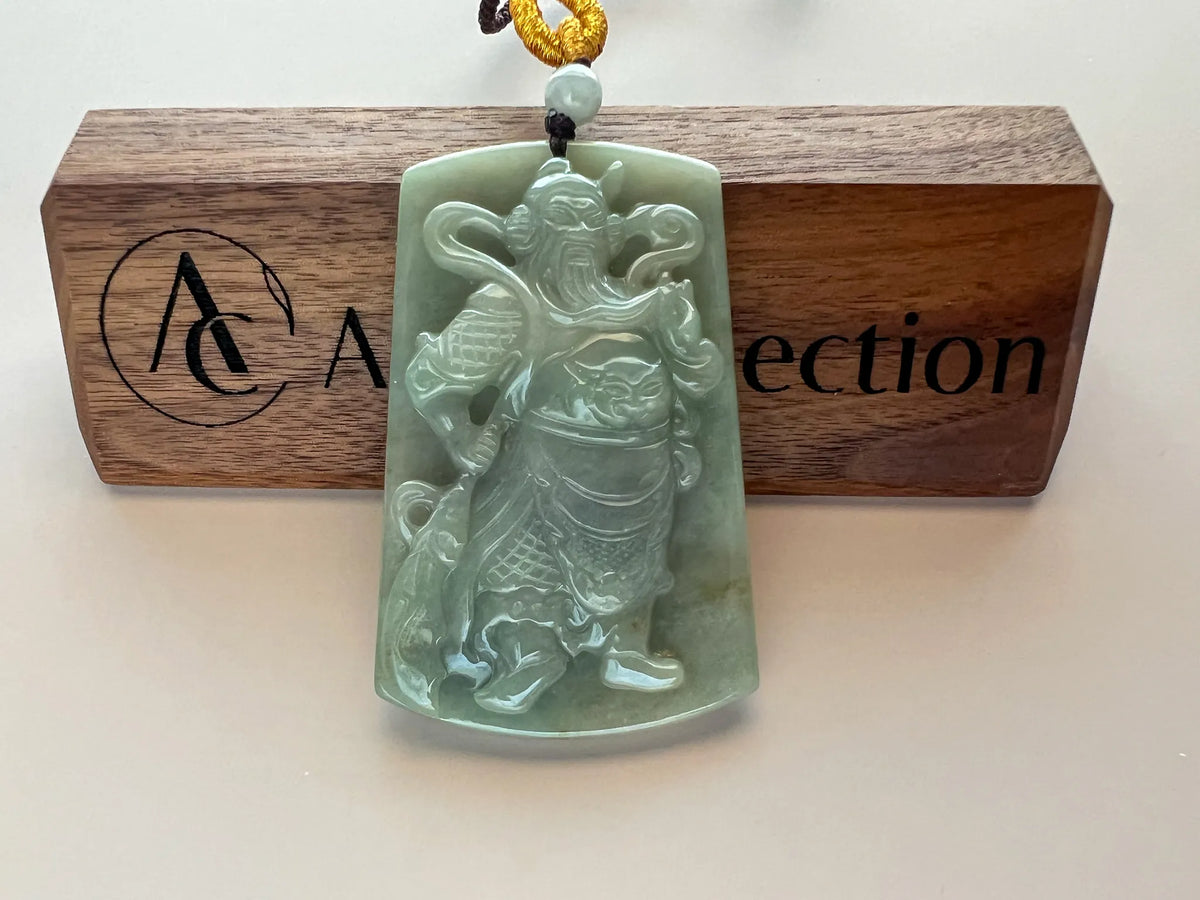 Aria Design Collection natural jade Guan Gong pendant with detailed relief carving and polished light green finish