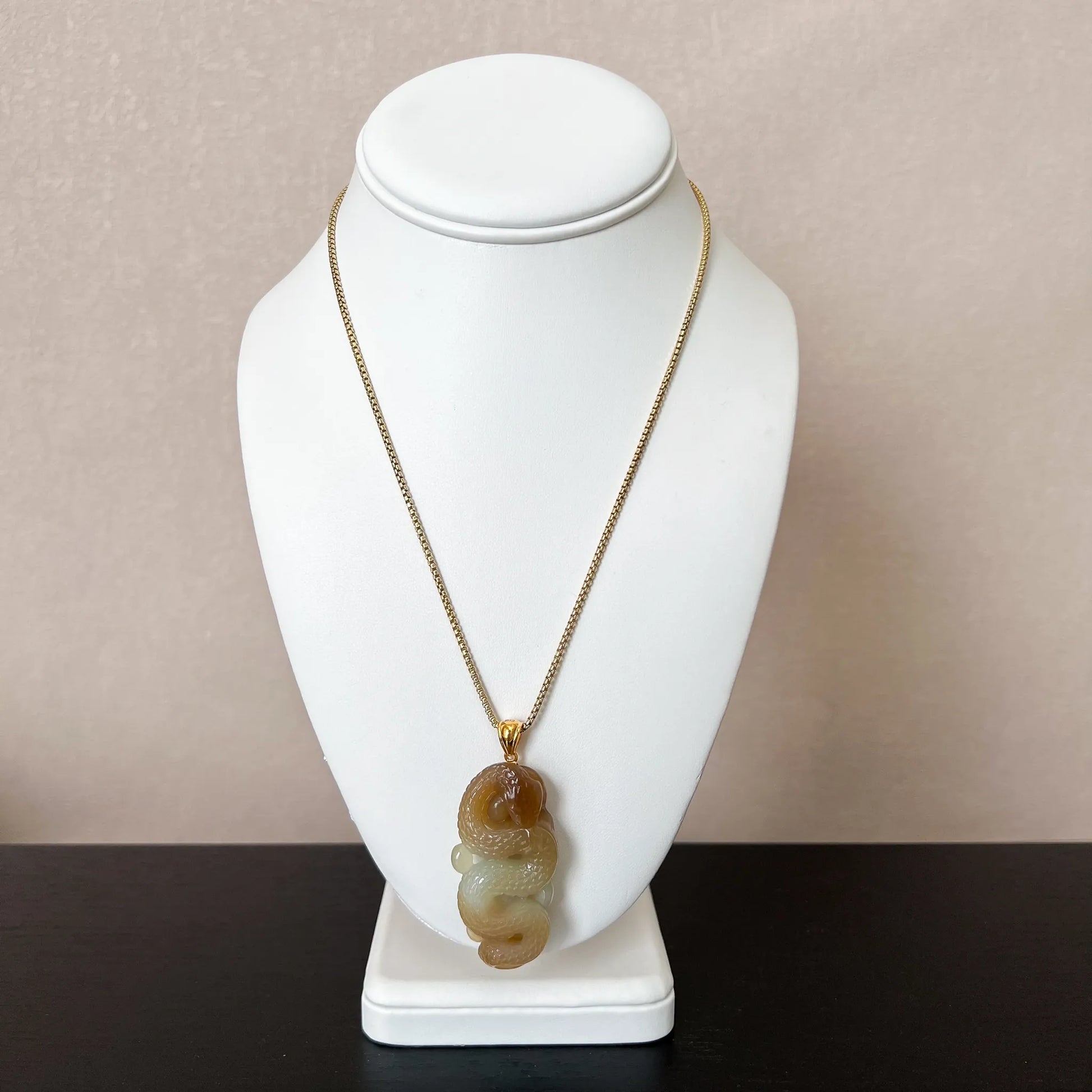 Aria Collection Natural Jade pendant with gourd-like carving, yellow-green translucency and polished finish