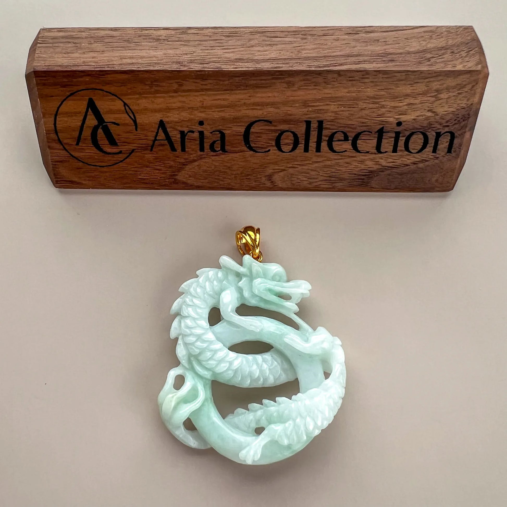 Pendant shown with Aria Collection wooden box for scale and presentation