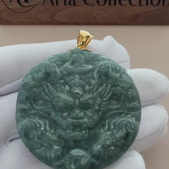 Video of a hand-carved jade pendant with nine dragons and faceless Buddha, accented by an 18K yellow gold bail