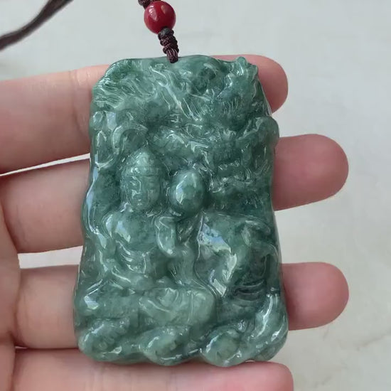 Video of hand-carved jade pendant with Amitabha Buddha and dragon, intricate serene green carving