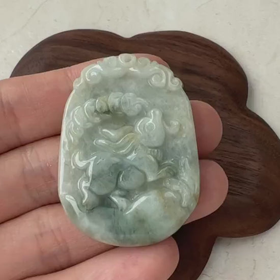 Video of hand-carved natural jadeite rabbit pendant in green jade, with Chinese coins and daikon radish detail