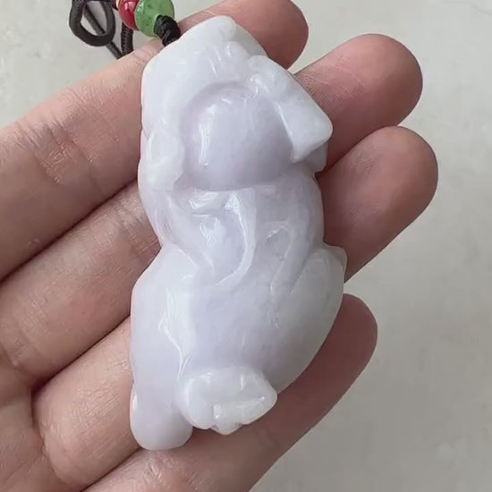 Video of a light purple jadeite Pi Xiu pendant, hand-carved in an elegant mythical Chinese style for wealth and protection