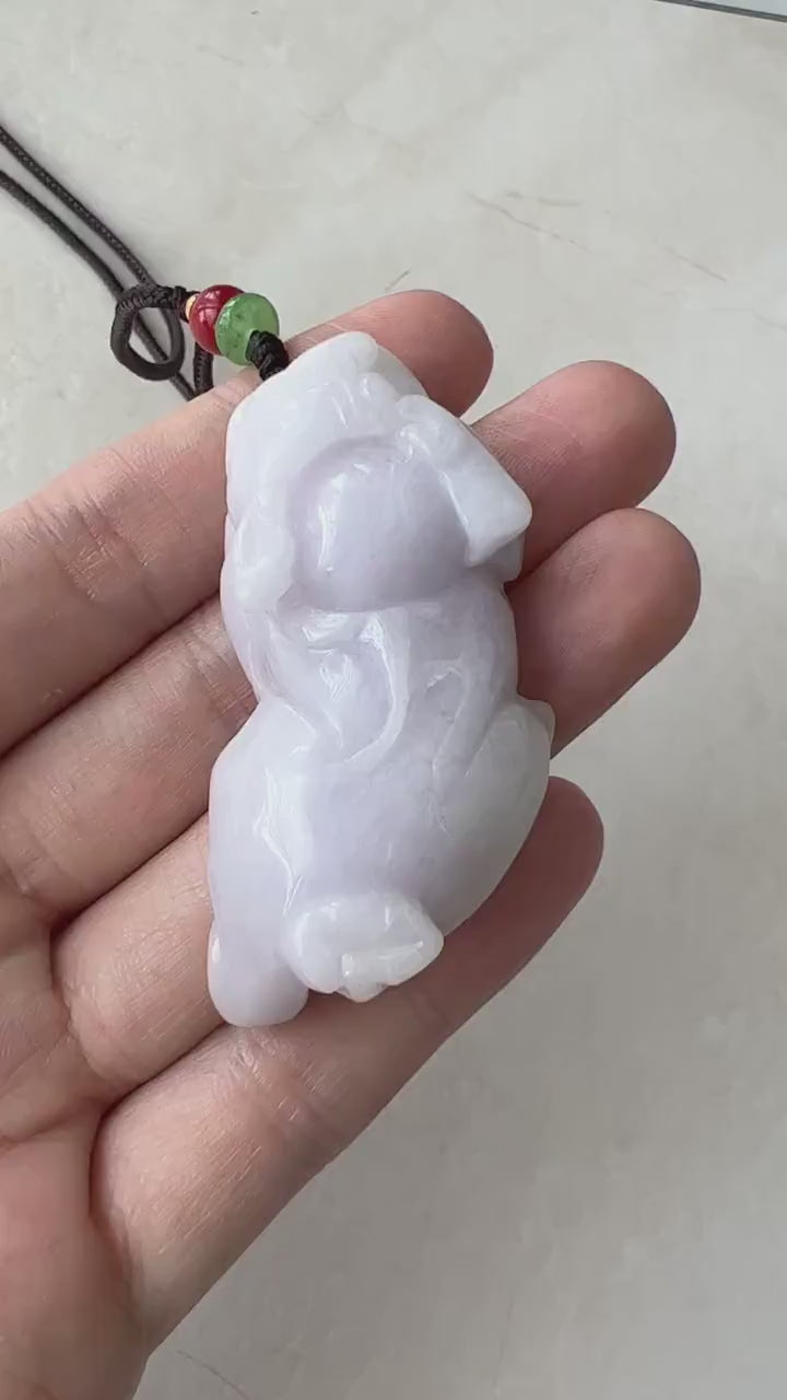 Video of a light purple jadeite Pi Xiu pendant, hand-carved in an elegant mythical Chinese style for wealth and protection