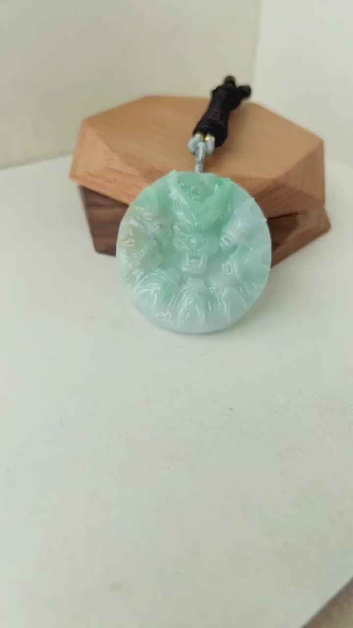 Video of hand-carved green jade jewelry with nine intricate dragon carvings in a majestic, detailed style