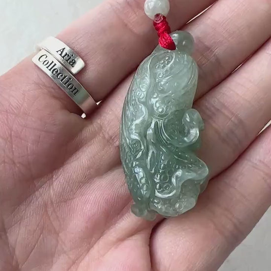 Video of hand-carved jadeite jade cabbage pendant necklace in rich natural green tones with organic stone texture