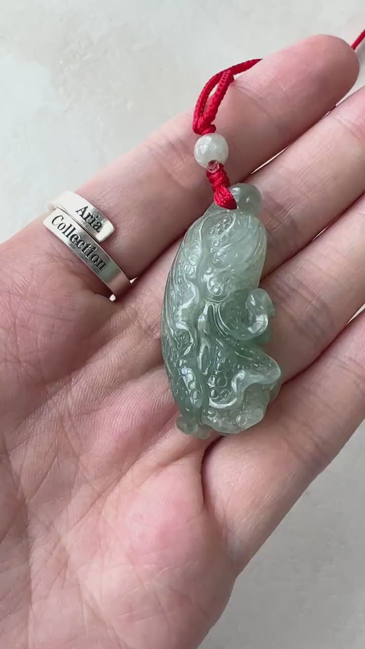 Video of hand-carved jadeite jade cabbage pendant necklace in rich natural green tones with organic stone texture