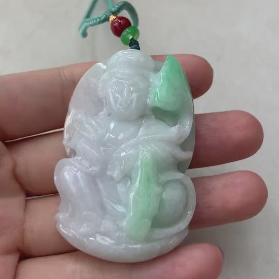 Video of a hand-carved natural jade Guan Yin pendant with a substantial thick profile and intricate details
