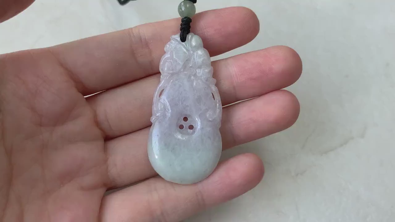 Video of a hand-carved light lavender jadeite calabash hulu pendant with delicate traditional gourd details
