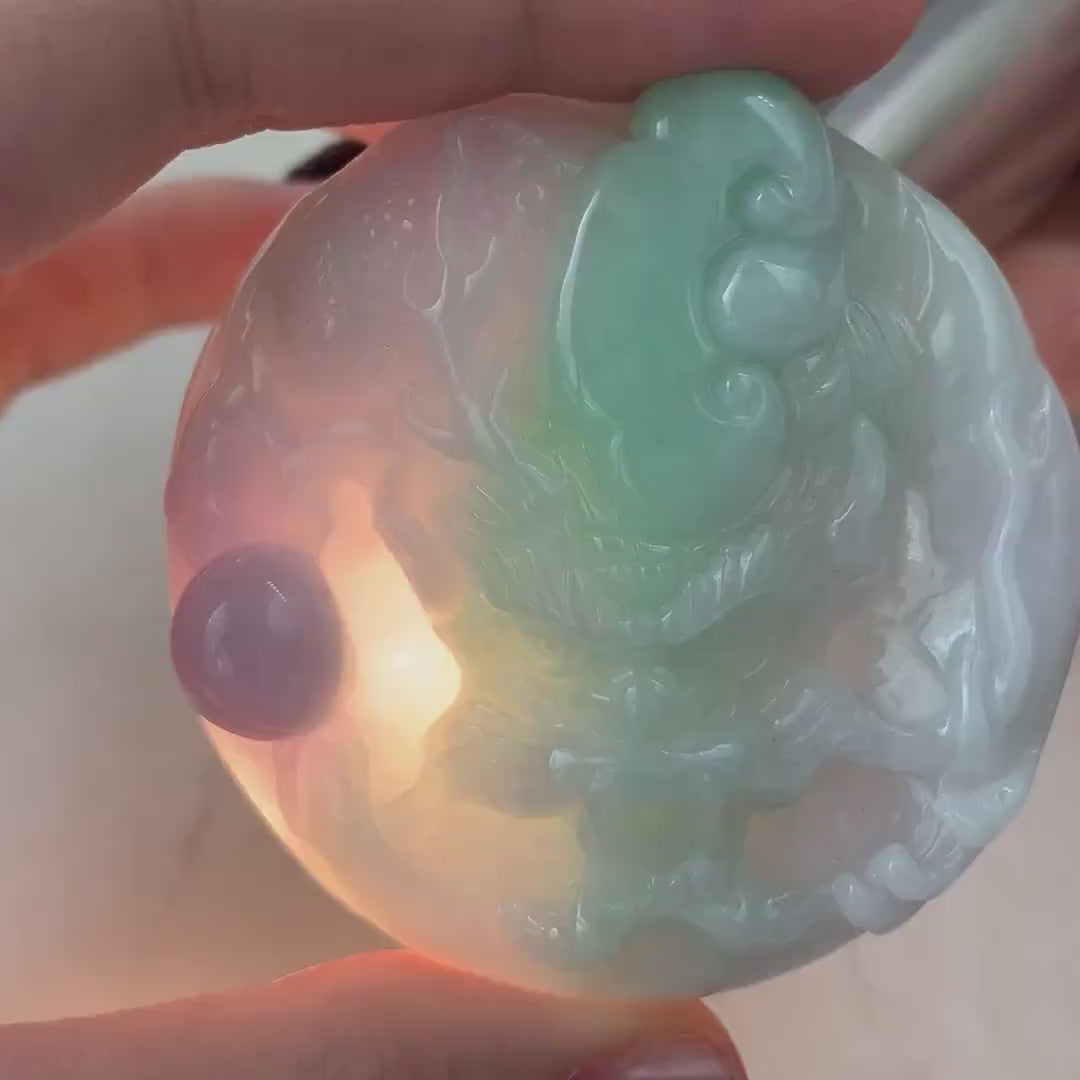Video of one-of-a-kind green jadeite dragon pendant with intricate hand-carved details and Ruyi motif