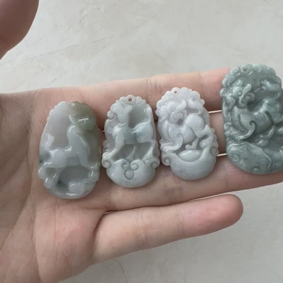 Video of hand-carved natural jadeite Dog Zodiac pendant in unique multicolor translucent jade with organic texture