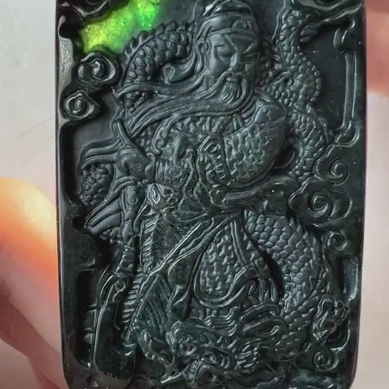 Video of black jadeite pendant with Guan Gong and dragon carving, floral reverse, deep black oily luster, green translucency
