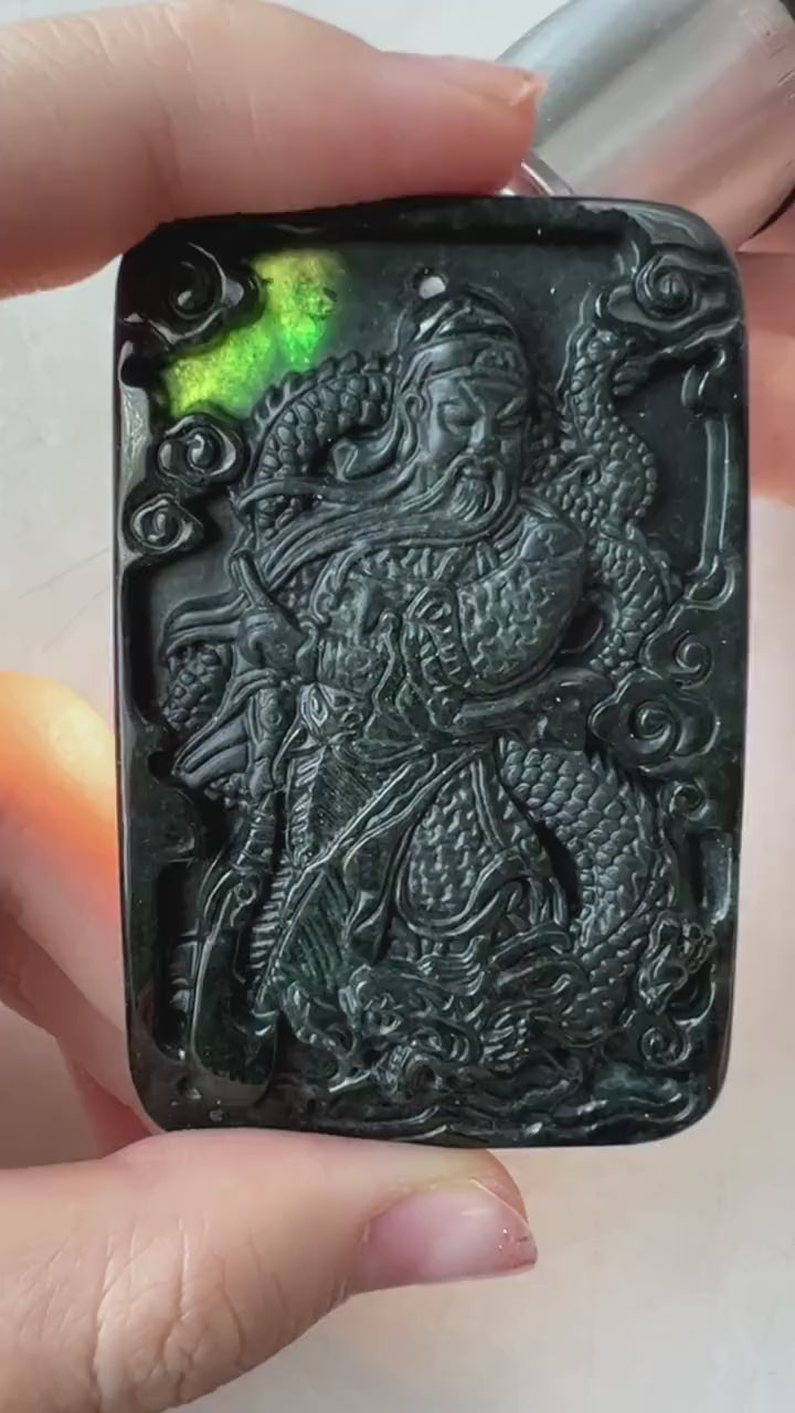 Video of black jadeite pendant with Guan Gong and dragon carving, floral reverse, deep black oily luster, green translucency