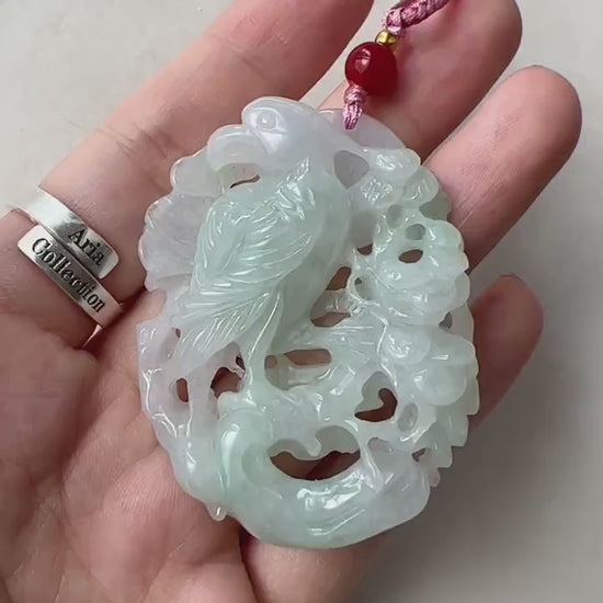 Video of hand-carved jadeite pendant with eagle and winter branches, icy white and celadon green openwork detail