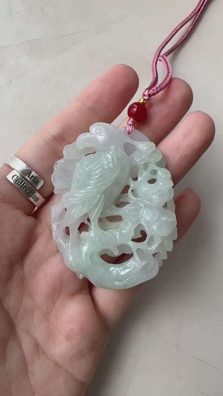 Video of hand-carved jadeite pendant with eagle and winter branches, icy white and celadon green openwork detail