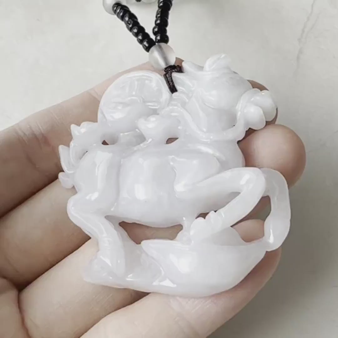 Video of a hand-carved gold horse pendant with ancient coin motif on a beaded 24-inch necklace
