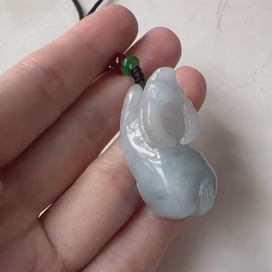Video of a natural untreated jadeite jade pendant with a finely carved Ox in a classic green Chinese Zodiac style