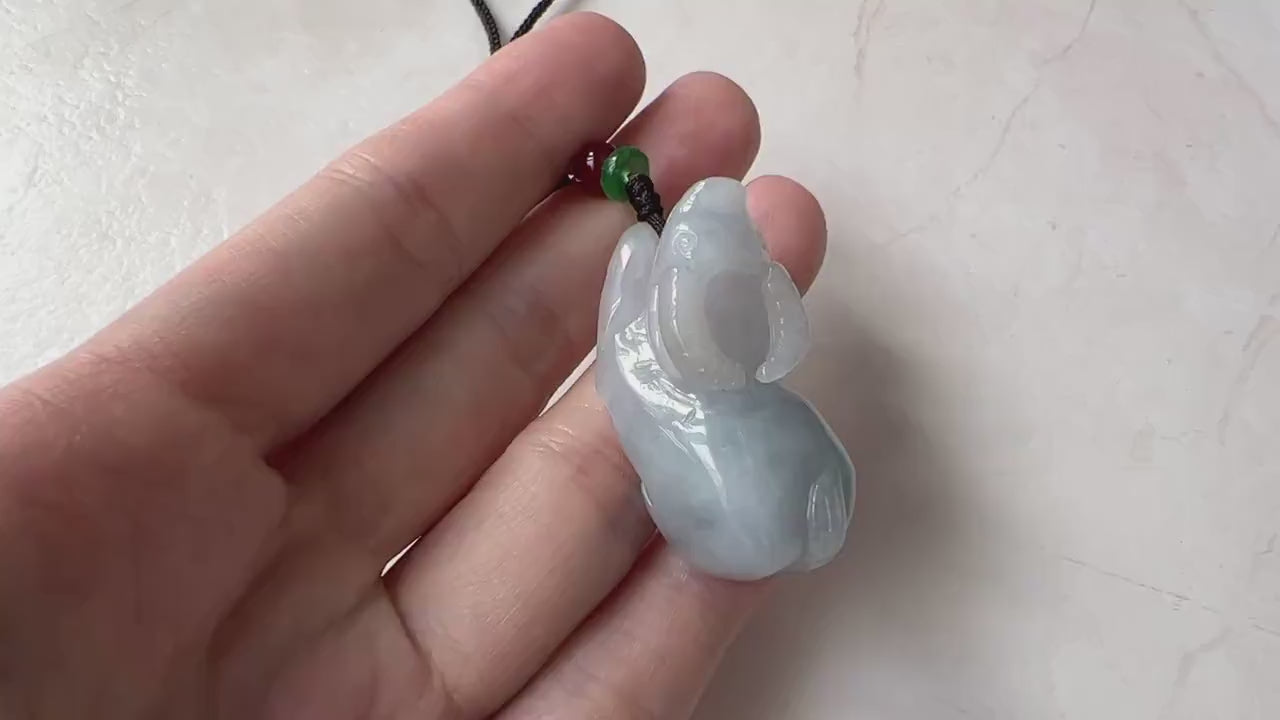 Video of a natural untreated jadeite jade pendant with a finely carved Ox in a classic green Chinese Zodiac style