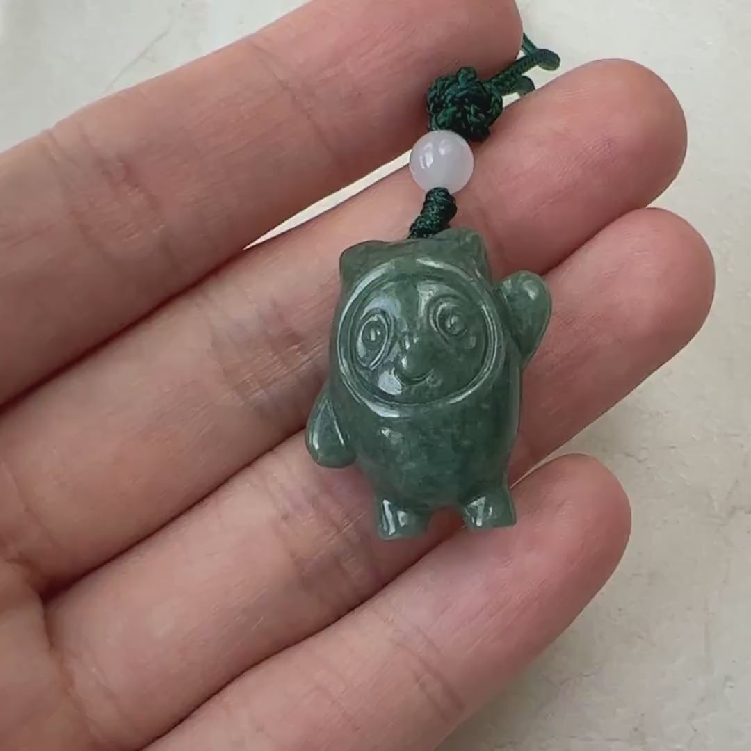 Video of a hand-carved cartoon panda with playful charm and distinctive character