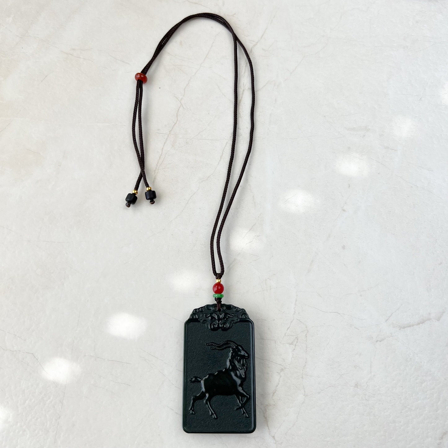 Nephrite Jade Vairocana Buddha, Da Ri Ru Lai, Đại Nhật Như La, Dark Green Carved Jade Goat Sheep Buddha Pendant Necklace, RM-1221-1649431602 - AriaDesignCollection