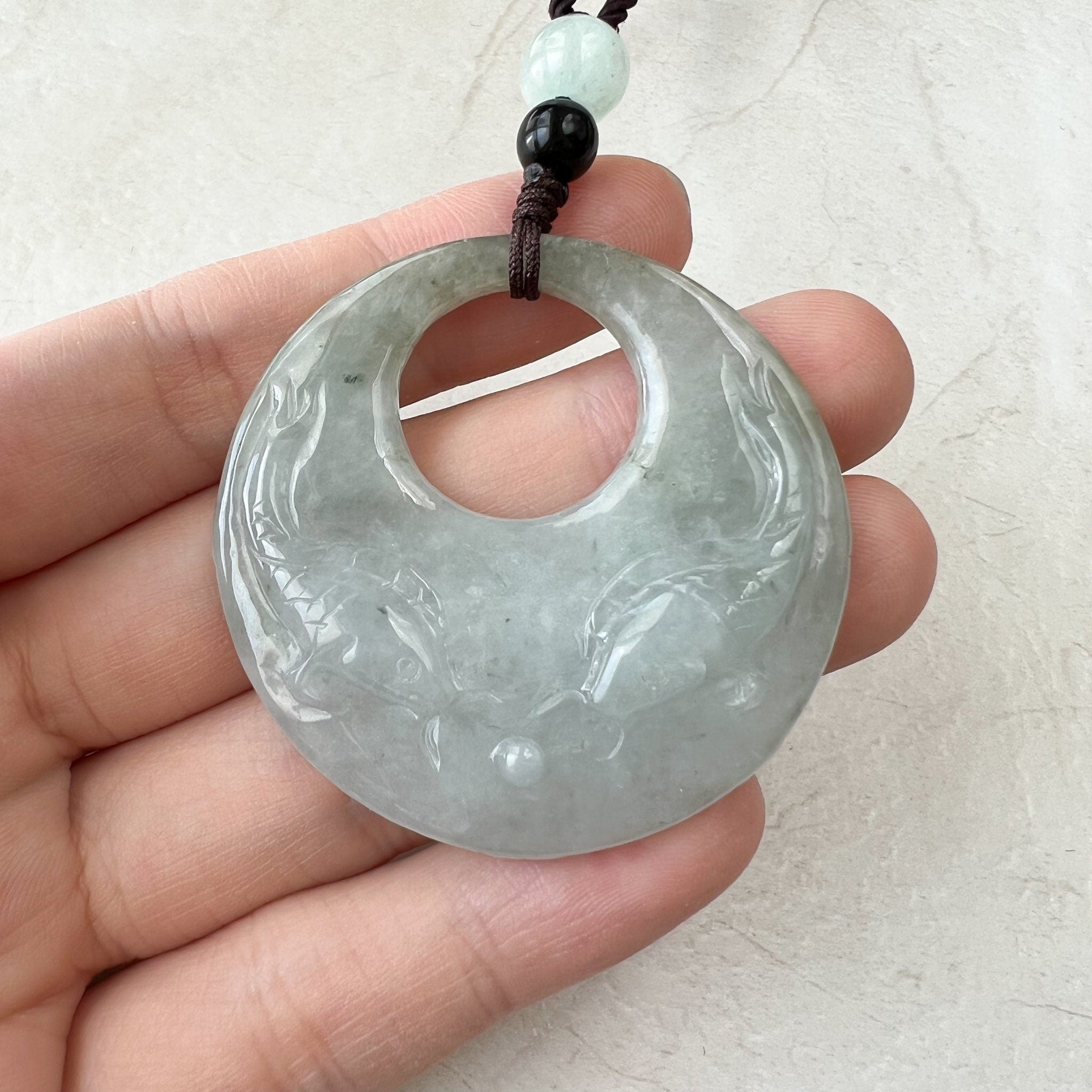 Pisces jade outlet pendant